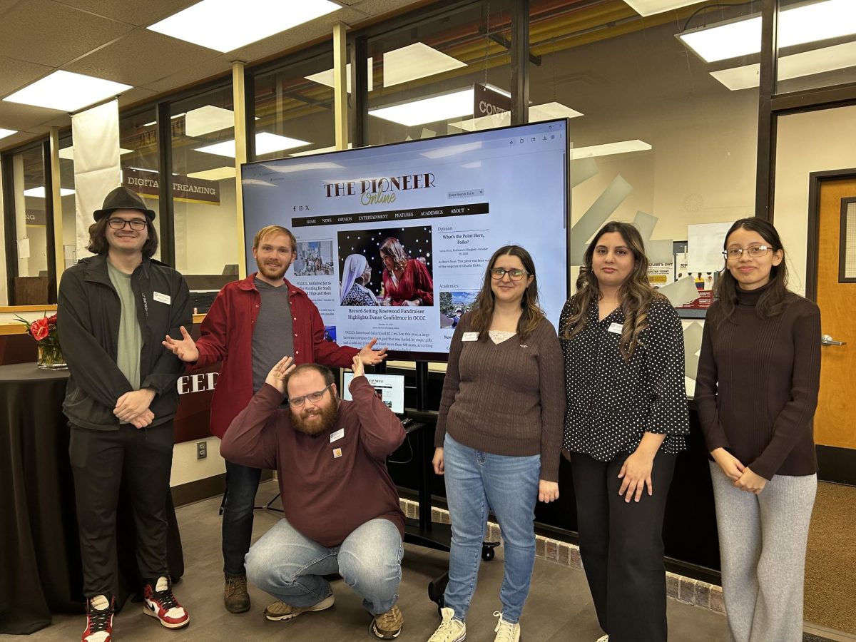 Pioneer staffers (from left) Peyton Seybolt, Trey Brice, Jonas McGee, Jannelly Gomez, Masooma Rizvi and Sonia Diaz unveil the paper's new website ahead of an open house celebrating The Pioneer's 50th birthday.