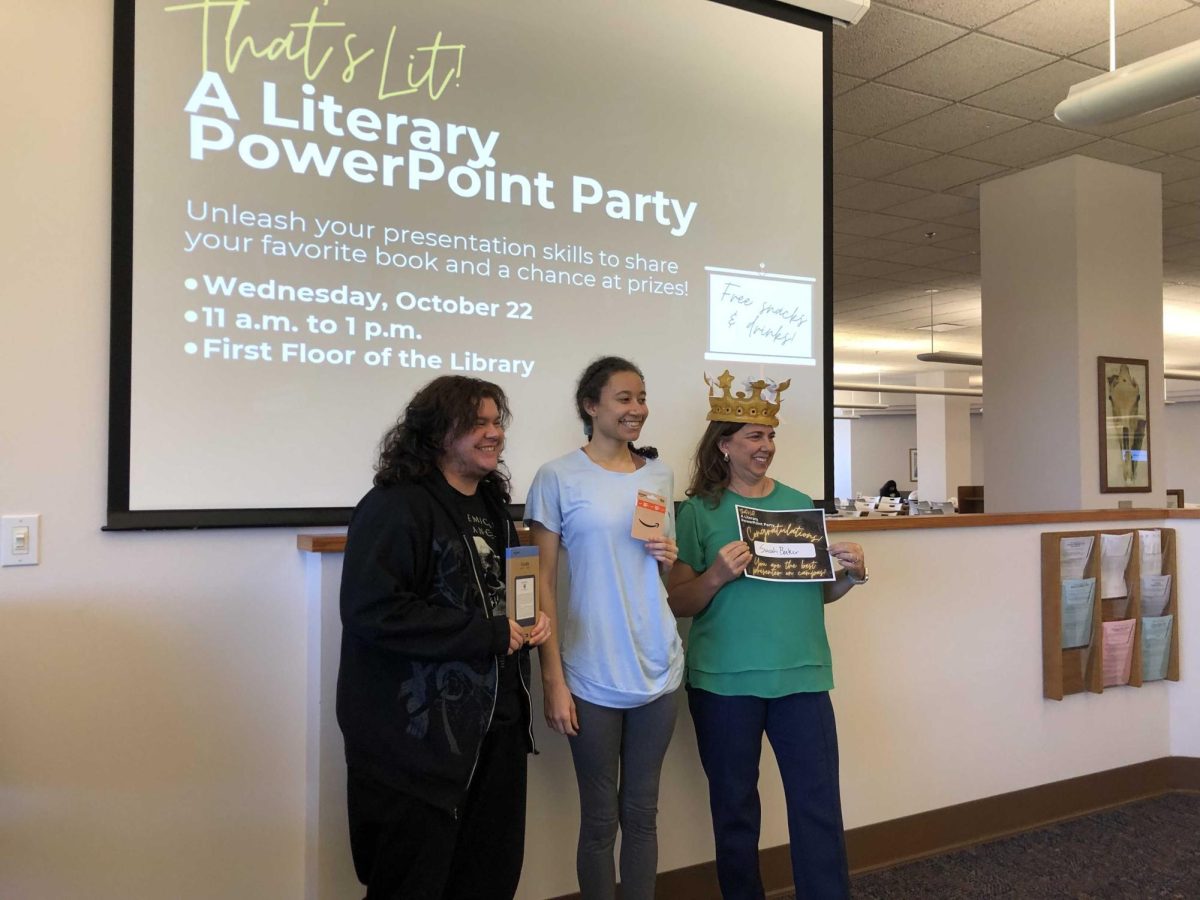 Winners of the recent Literary PowerPoint Party (from left) Elyas Anderson, Lindsey Timsah and Sarah Baker proudly display their awards.