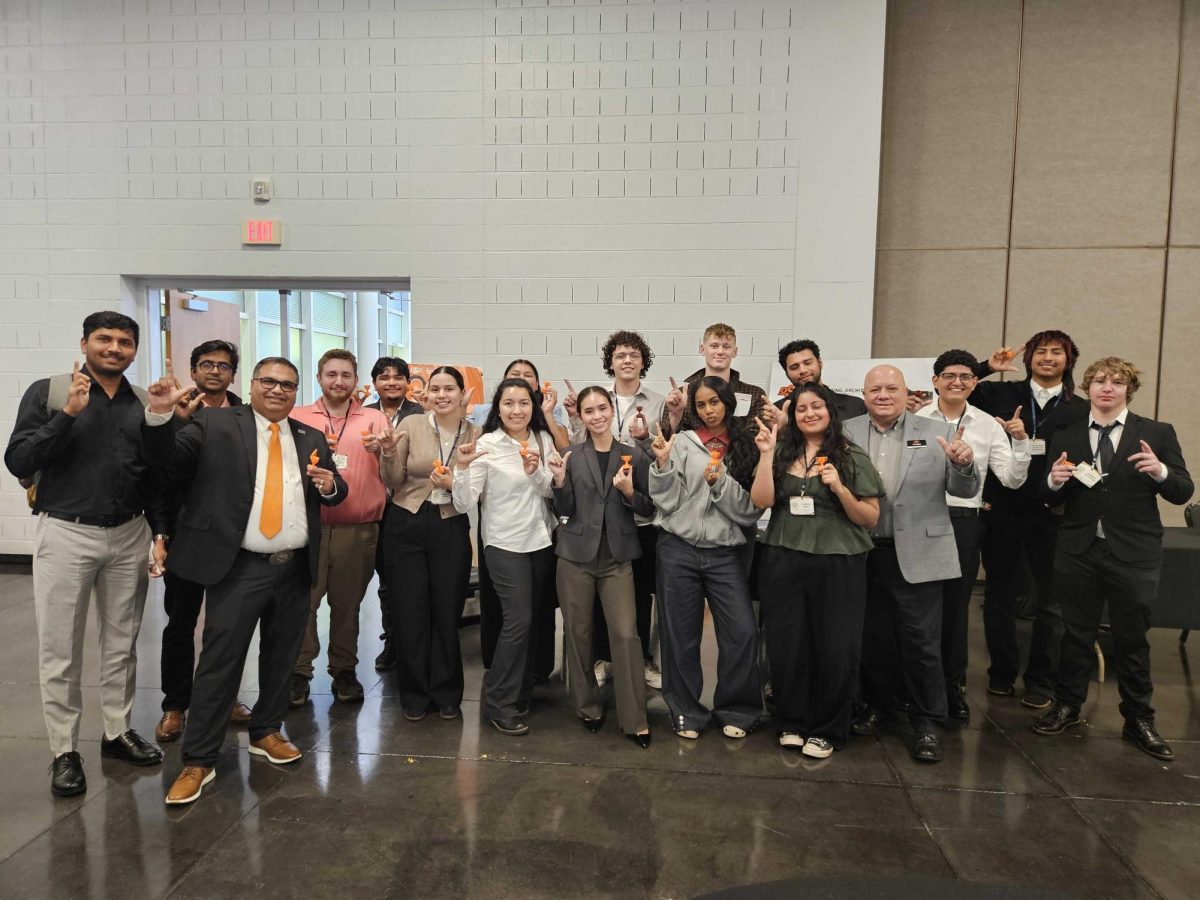 OCCC engineering students capture a treasured memory together after attending the Roger Farrer Energy Conference.