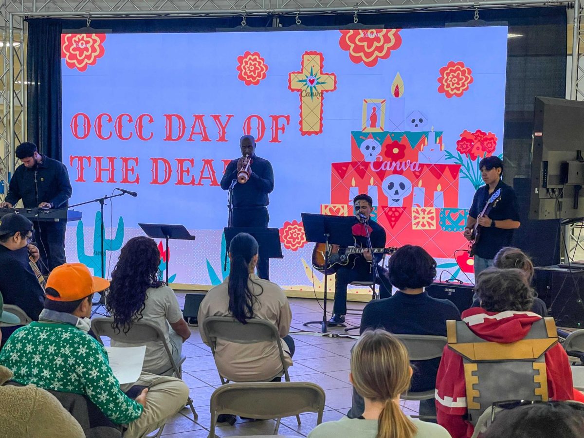 Taking part in the recent Día de los Muertos celebration on campus, (pictured from left to right) Hispanic Student Association President Monte Ojeda, Instructional Designer Lorne Lee and Student Government Association Director of Public Relations David Hernandez perform traditional songs for the audience.