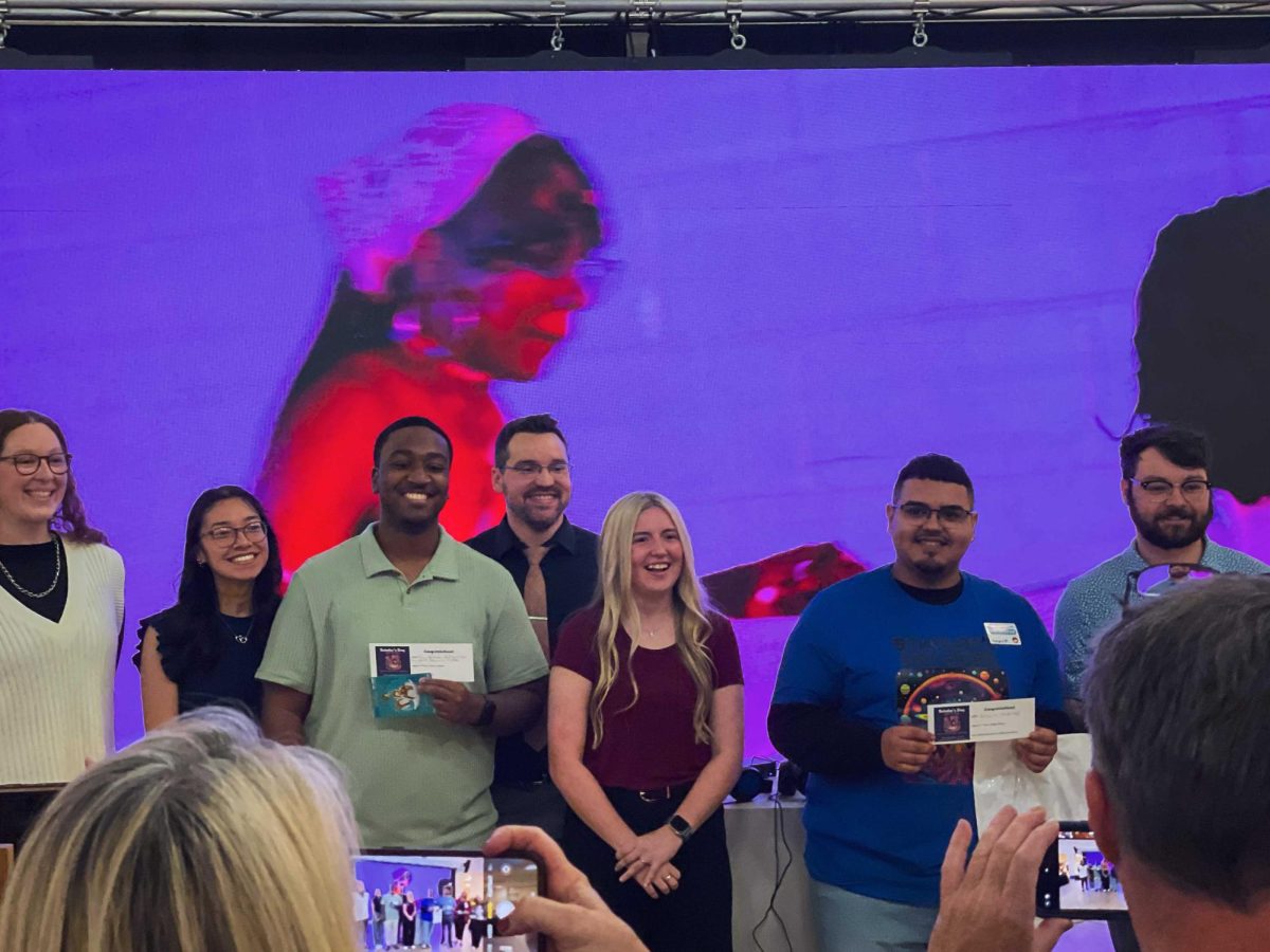 OCCC students who won awards for their presentations at Scholar's Day proudly display their certificates for scholarships and tuition waivers.
