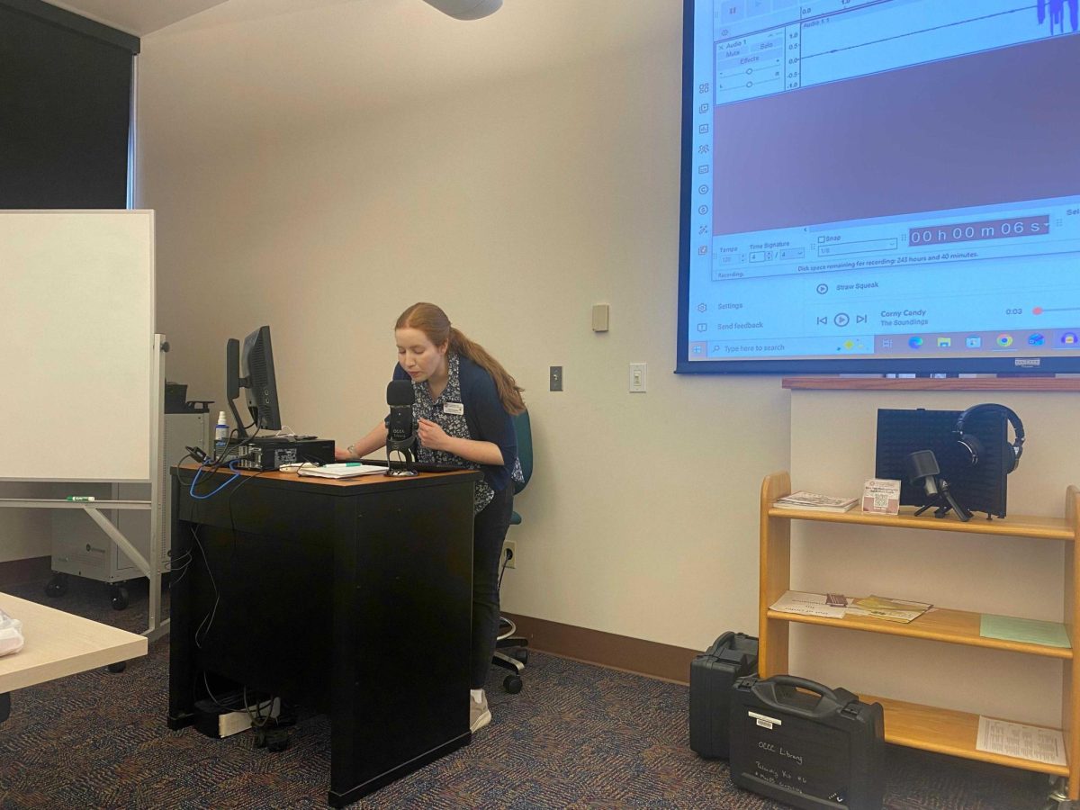 Katie Chestnut, a technology lending specialist at OCCC, records and edits audio in Audacity during a recent "Podcasting 101" workshop, showcasing real-time waveform editing and effects for crisp podcast production.