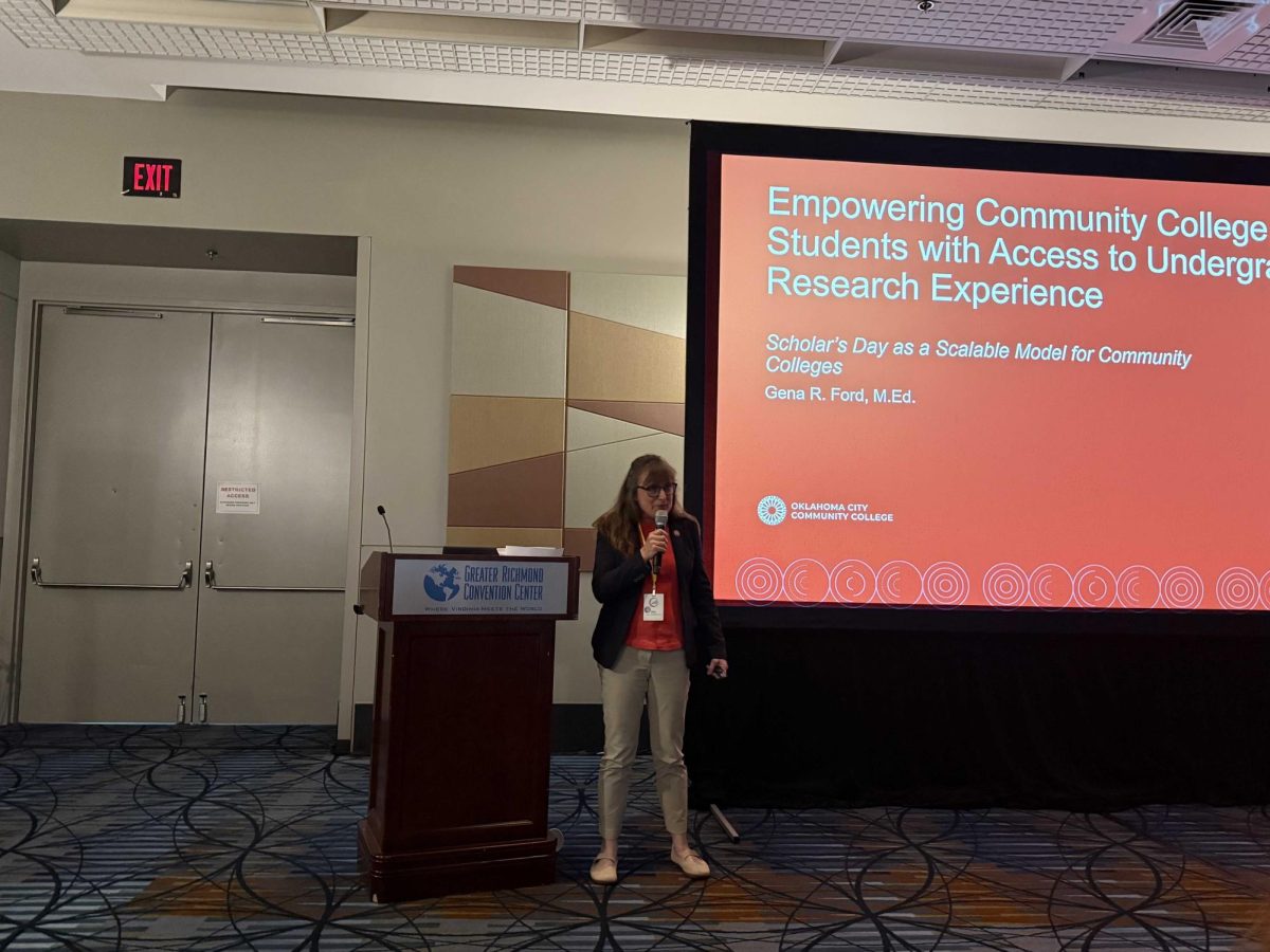 OCCC Professor of English Gena Ford gives a presentation on empowering community college students to pursue undergraduate research at a national conference that she recently attended, along with five OCCC students, in Virginia. 