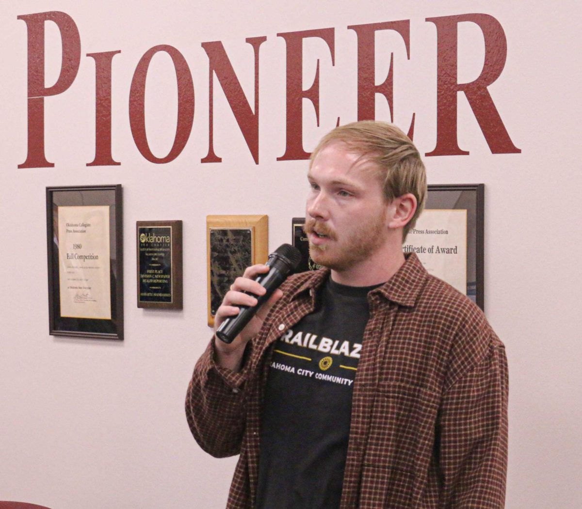 Pioneer Editor-in-Chief Trey Brite sings his heart out with the help of a karaoke machine, a key attraction at every Pioneer staff party.