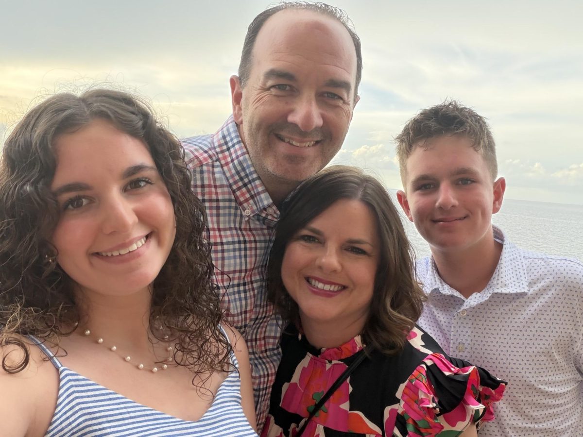 Dr. Jay Corwin poses for a photo with his family. Spending time with his family is Corwin's favorite thing to do. "I love doing all the things that keep them entertained. I tell bad dad jokes. I go to any other activities that I can be at," he said.