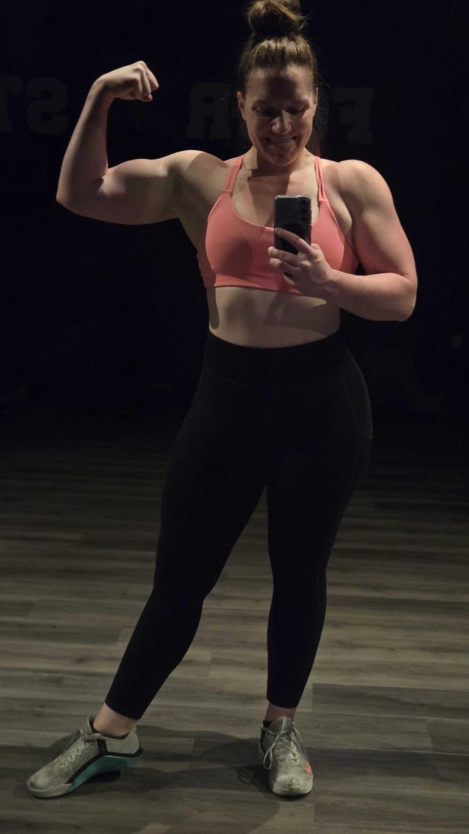 OCCC graduate Shelby Webb shows off her passion for fitness, one of the ways she maintains balance outside of her career as an aerospace engineer.
