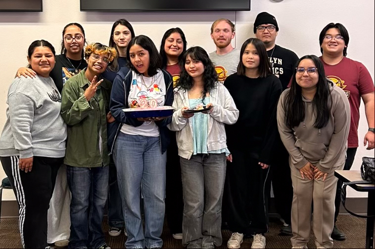 Following a Latinas Unidas meeting, Ruby Valdez (holding cake) prepares to celebrate her birthday at a surprise party organized by her friends.