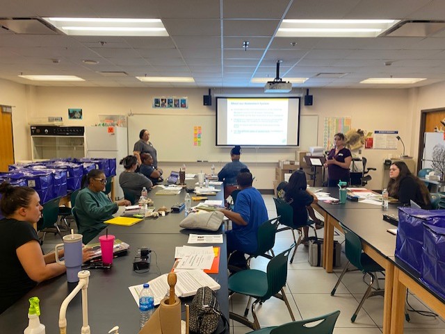 Oklahoma City Public Schools middle and high school teachers gather in an OCCC science lab for an OK-INBRE workshop aimed at boosting science instruction across the state.